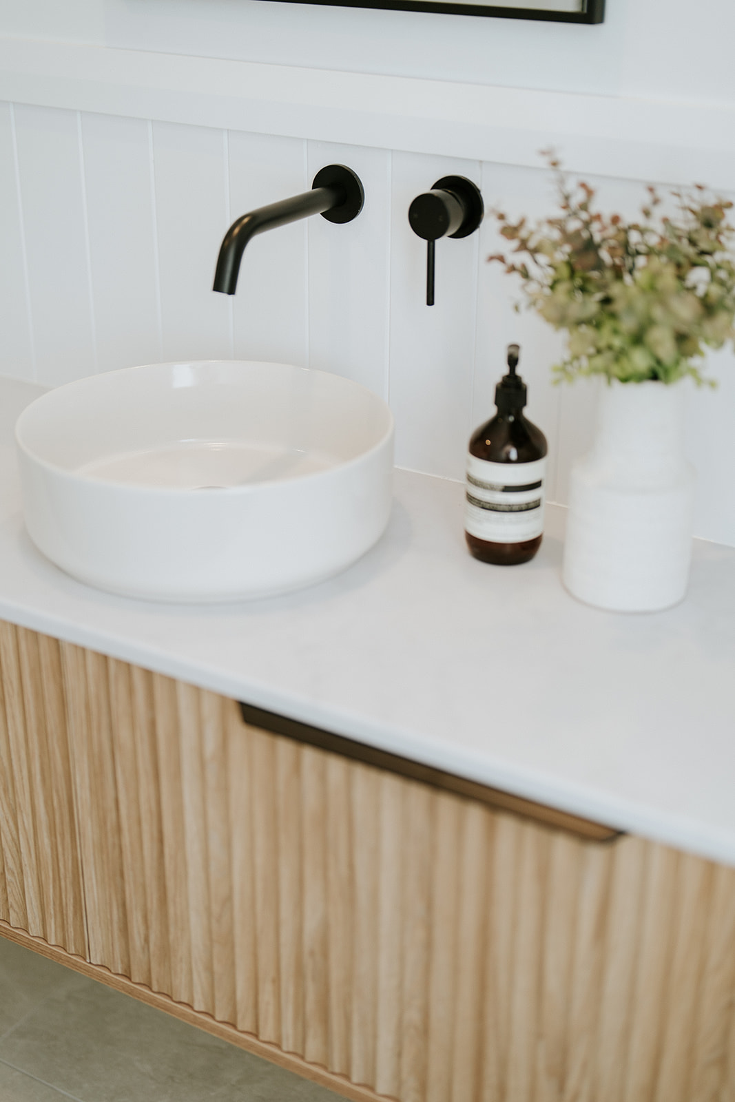 Custom vanity with a sink and ABI Tapware